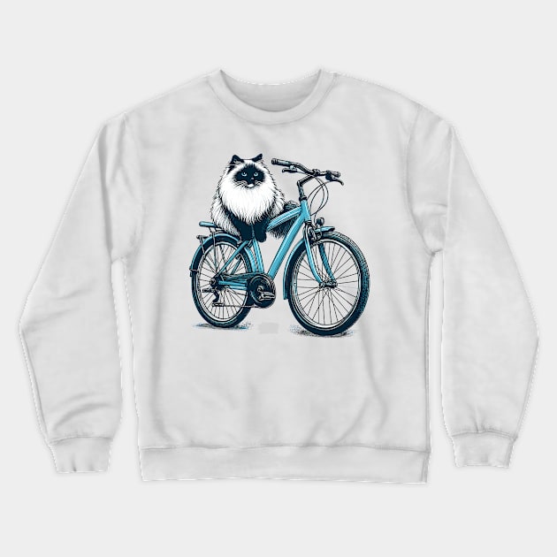 Ragdoll Cat On A Bicycle Crewneck Sweatshirt by Graceful Designs